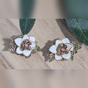 Gardenia Crystal and White Enamel Earrings with an Antique Gold Tone Finish